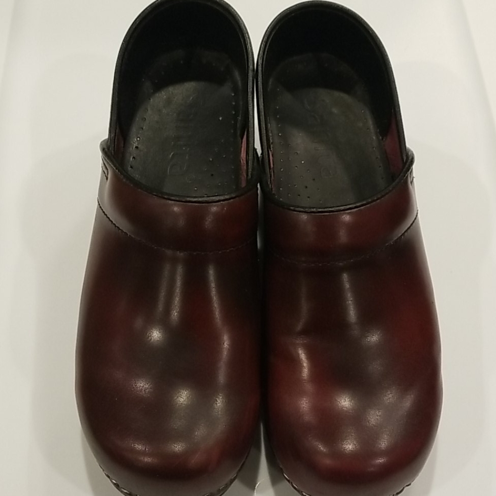 Sanita closed back clogs, dk red with black tones.